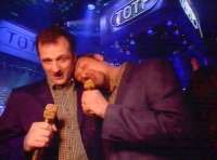 Lard rests his head on mark's shoulder