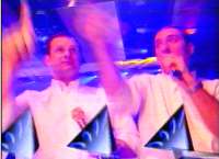 Mark & Lard point in the air